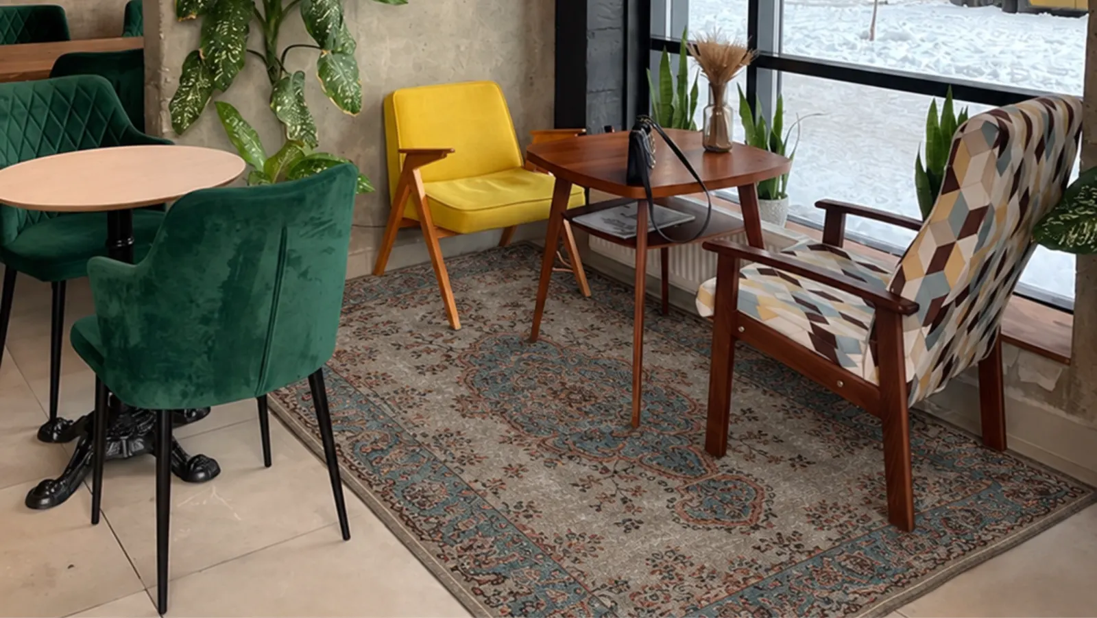 Café lounge styled with a Sempati Hali vintage rug for trade partners